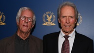 Director Clint Eastwood onstage with DGA 75th Anniversary Chair Michael Apted. 