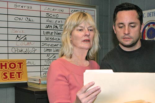 Mary Rae Thewlis and location manager Tom Ross plan the day's work on Law & Order set.
