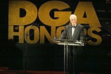 DGA President Michael Apted opens the ceremony.