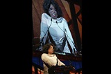 Television talk show host Oprah Winfrey takes the podium next.