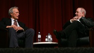 Director Clint Eastwood onstage with moderator Paul Schrader.  