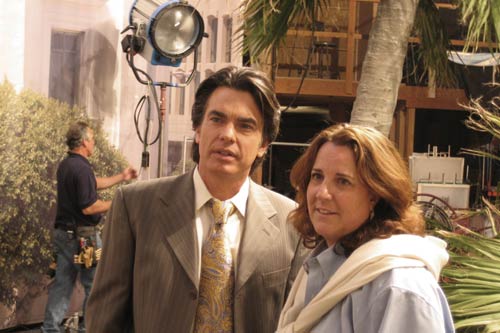 Lisa Cochran on The O.C. with cast member Peter Gallagher.