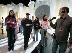  HERE SHE IS: Stage manager Gary Natoli directs traffic at the Miss America Pageant.- photo by AP Images.