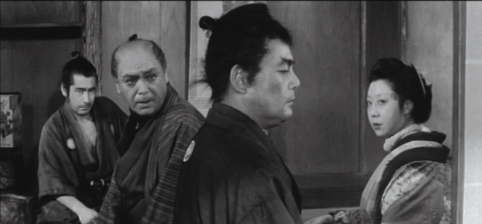 ONE -EYED JACK: Mifune's one good eye is visible in a patch of light after he is beaten and locked up in Kurosawa's Yojimbo (1961). - photo courtesy Criterion Collection